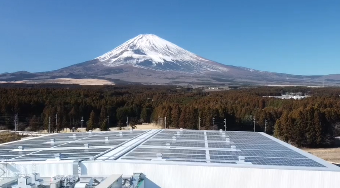 Beverage manufacturing plant in Shizuoka Prefecture with Mount Fuji visible behind the facility.
