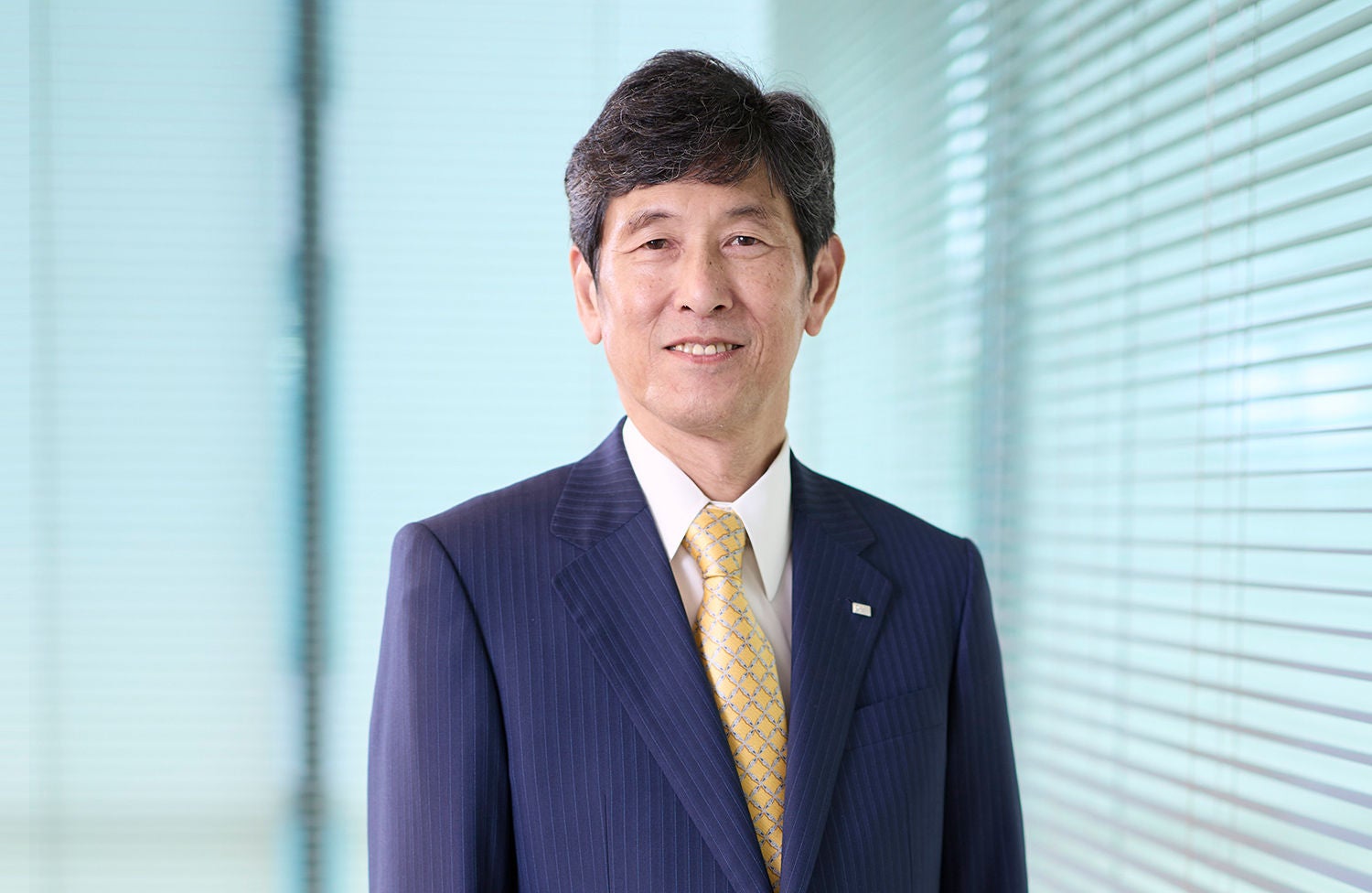 代表取締役社長の顔写真です。