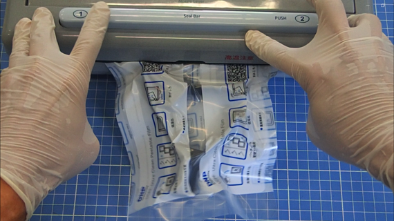 Photo of tearing open the inner bag of UCPF and taking out the product