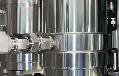 Close-up of N₂ Hood nitrogen flushing on the aseptic filler-capper