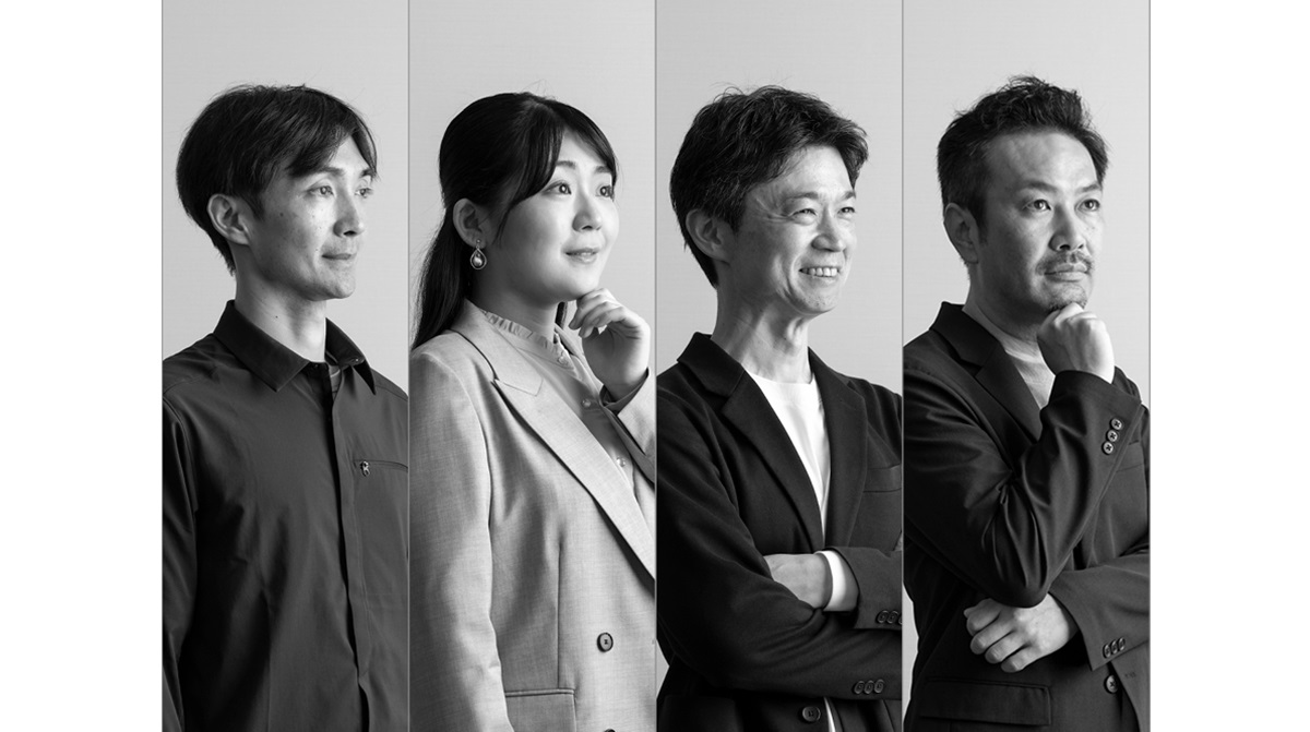 A photo of Tai, Hayashi, Sato and Katano posing and looking in the same direction